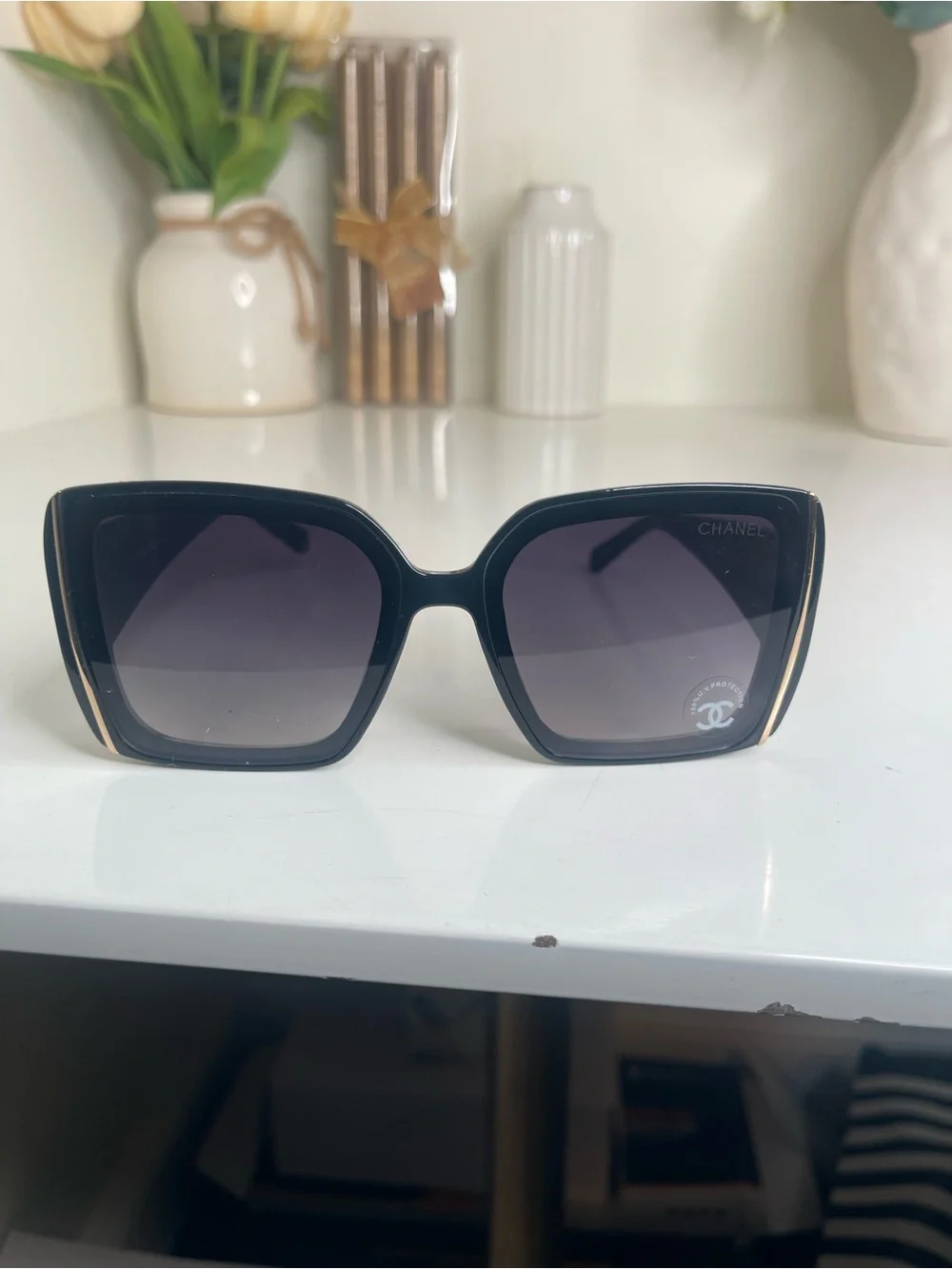 CHANEL Black Sunglasses with Gold Accent
